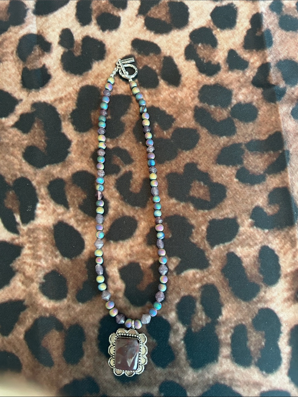 Iridescent Bead Necklace with Deep Purple Stone Pendant
